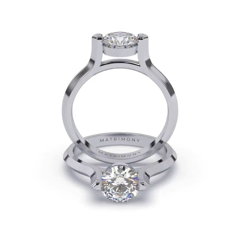 Hermoso anillo de compromiso solitario con un diamante redondo. Este modelo se encuentra disponible con piedras de zirconia ó diamante y en oro de 9k, 14k, 18k ó platino.